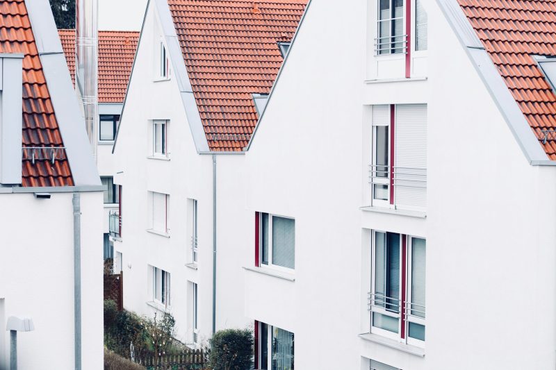 VA Home - 1 28 White houses with red roofs create a clean and modern suburb 1782234031