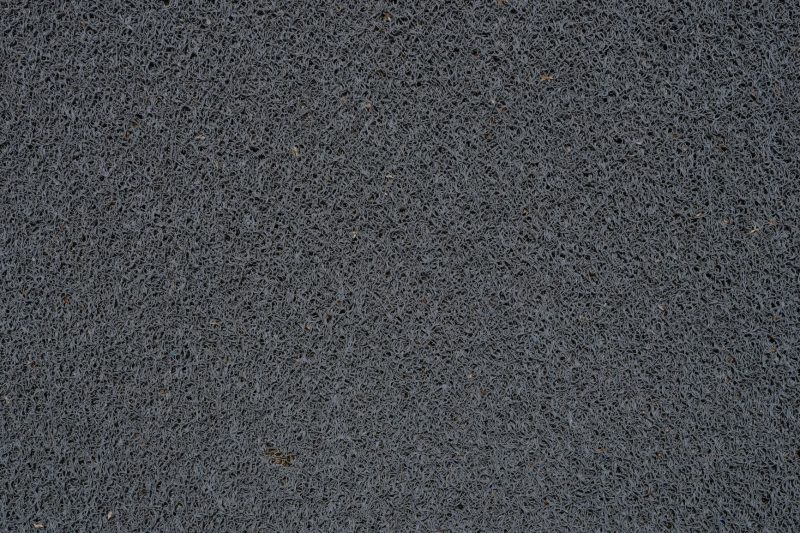 VA Home - 1 27 Detailed view of a gray synthetic doormat showcasing its fib 1786467764