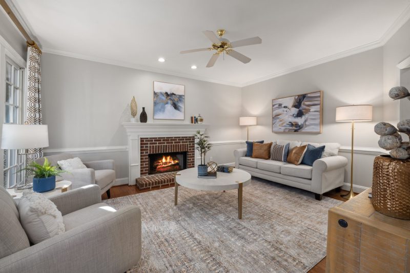 VA Home - 1 27 A cozy modern living room featuring a fireplace elegant sofa 1788282050